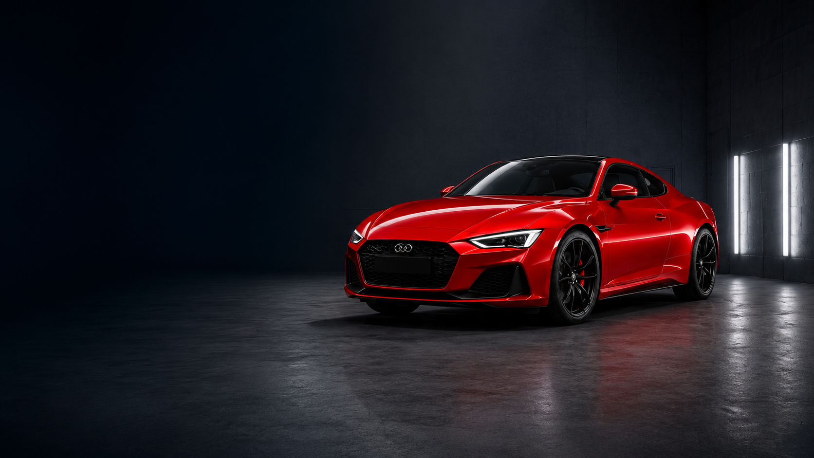 Red sports car in a dark paint studio